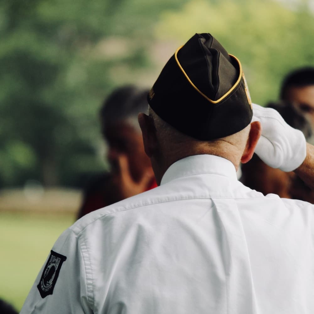 A veteran saluting his fellow service men and women.